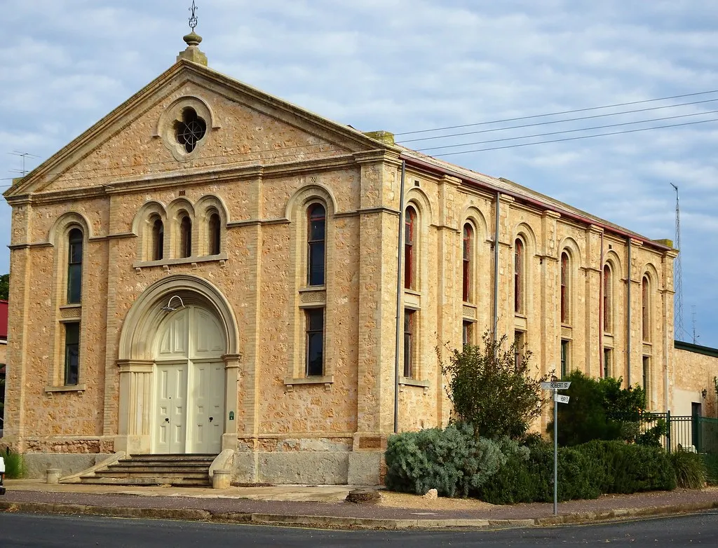 Moonta. Old copper mining town. This is the Bible Christian Methodist Church built in 1873 in the romanesque style with rounded windows. In 1913 sold to the Churches of Christ. Now a private residence.