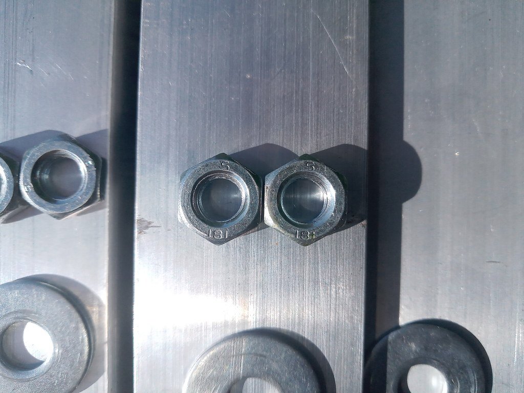 Nuts and washers for the bolts up-close