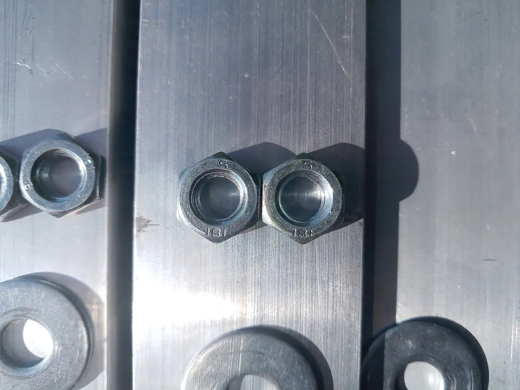 Nuts and washers for the bolts up-close