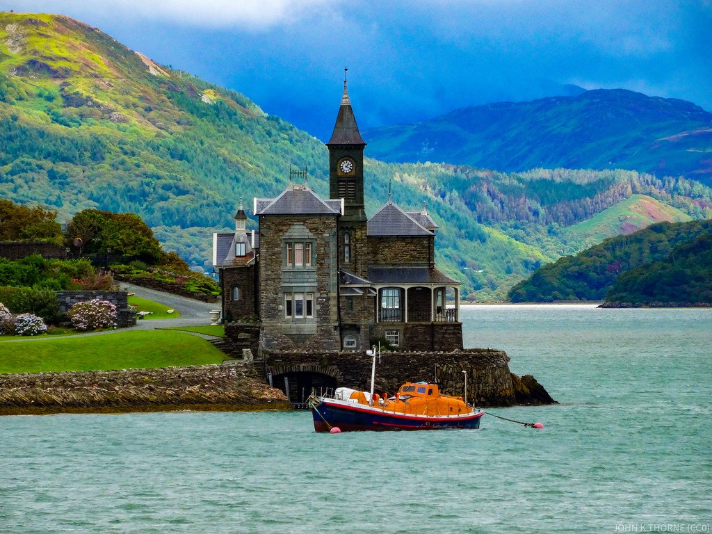 The Clock House Barmouth Eclectic Victorian Gothic house built by the Lowe family, mill-owners; the main, central section dates from c.1844, to which additions including a striking clock tower were added c.1890-1900