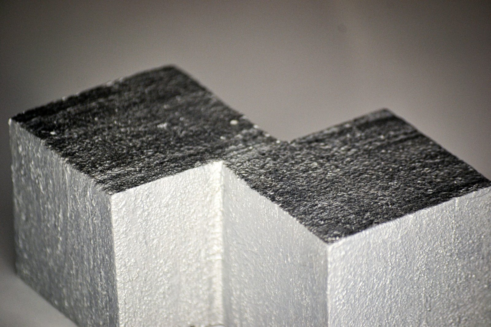 Two blocks of concrete sitting side by side