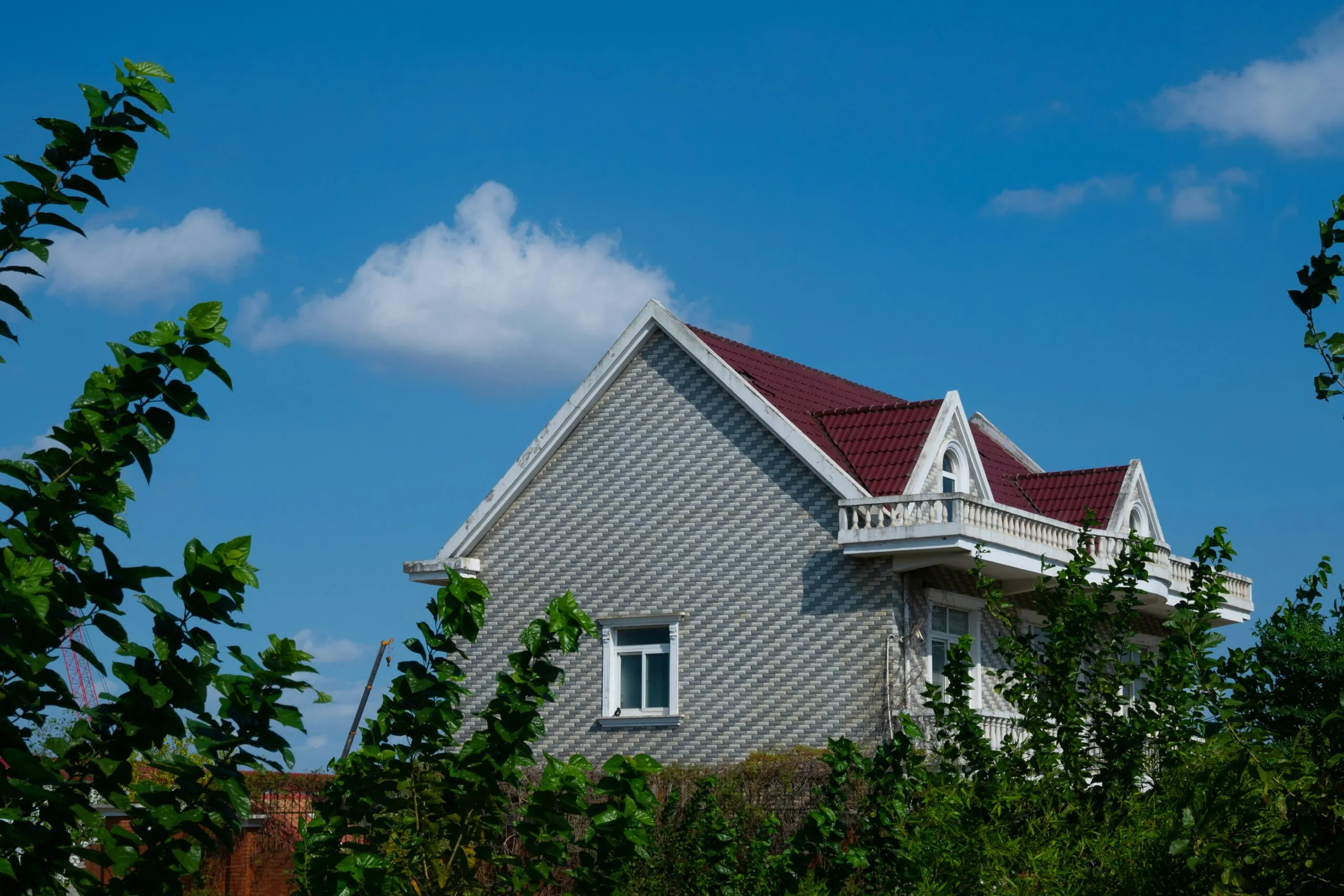 a house with a red roof and a red roof