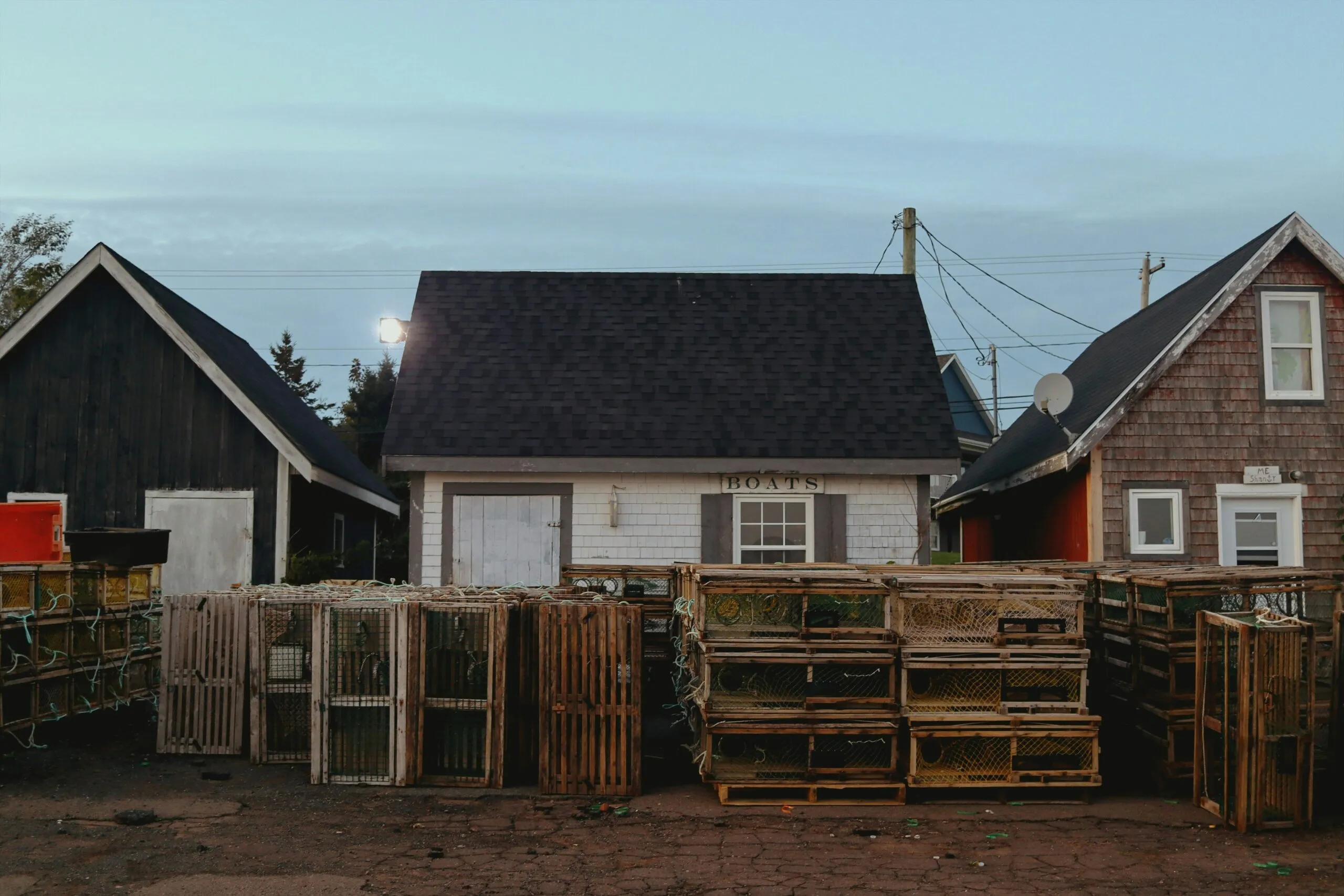 A group of wooden pallets in front of a house
