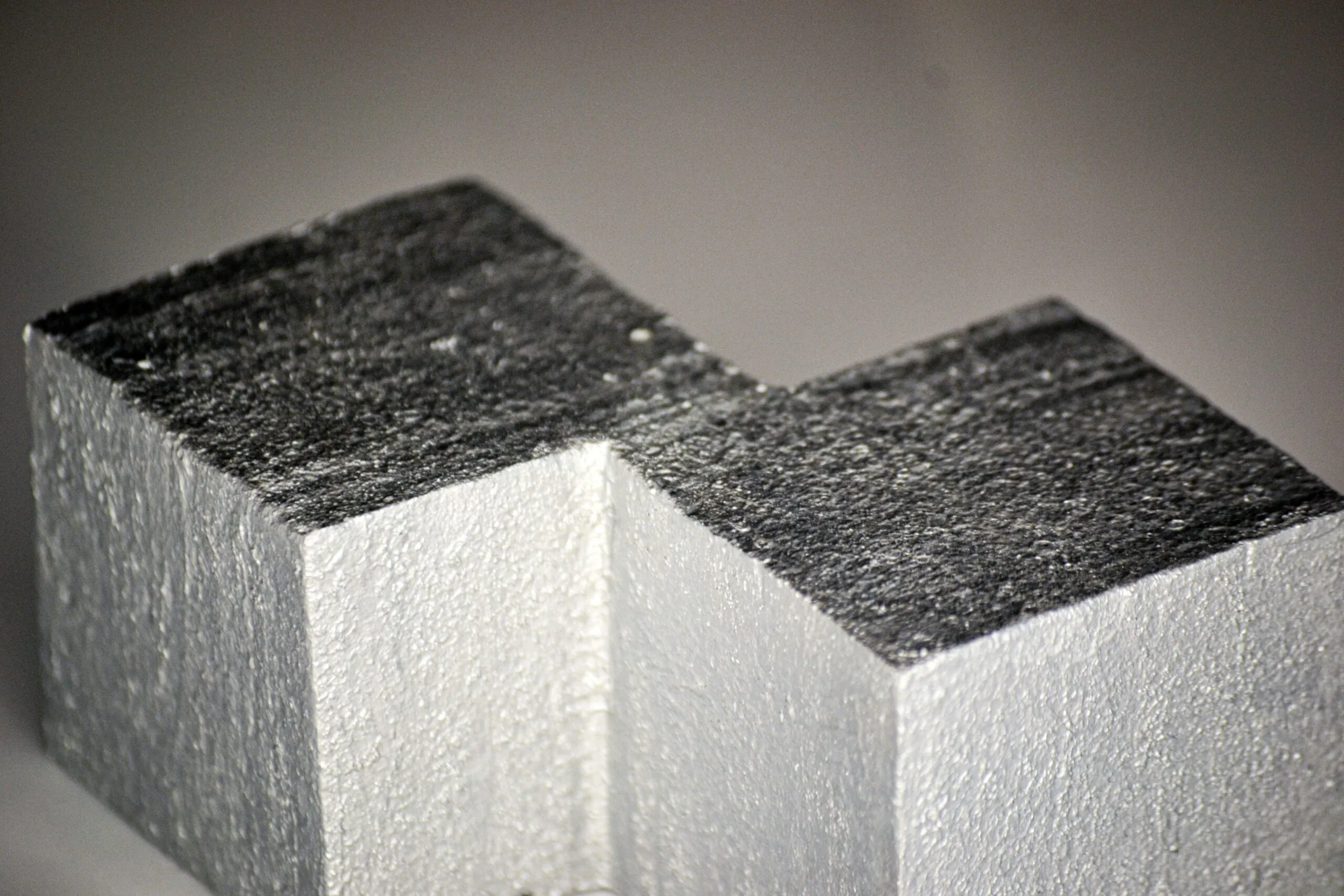 Two blocks of concrete sitting side by side