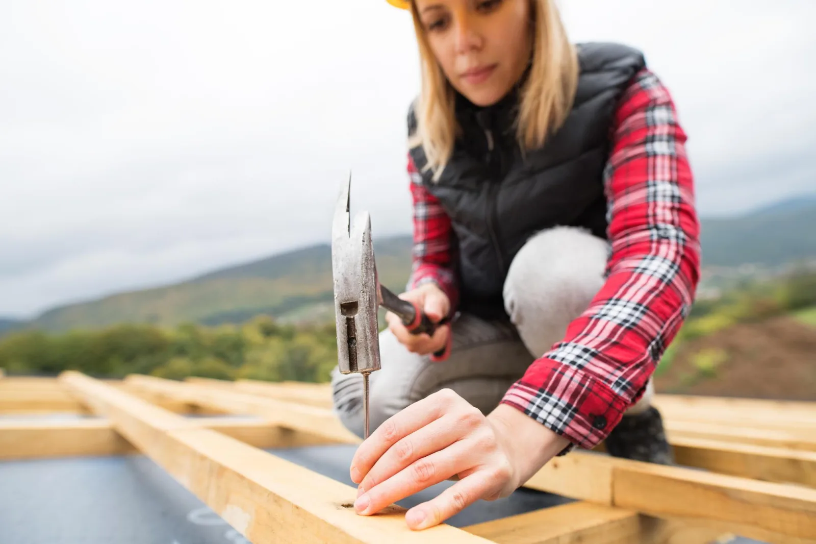 Young woman worker on the construction site