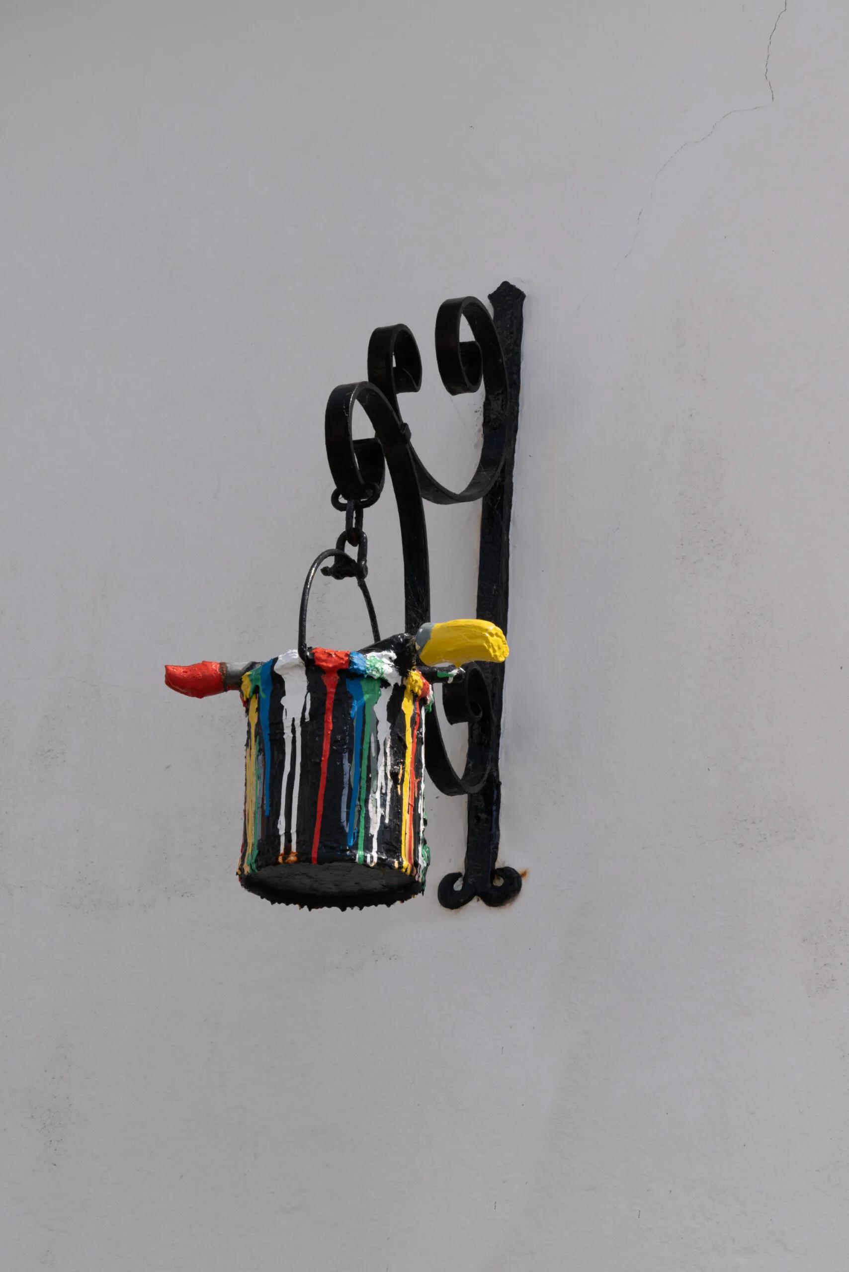 Bucket of paint and paintbrush shop sign professional painter