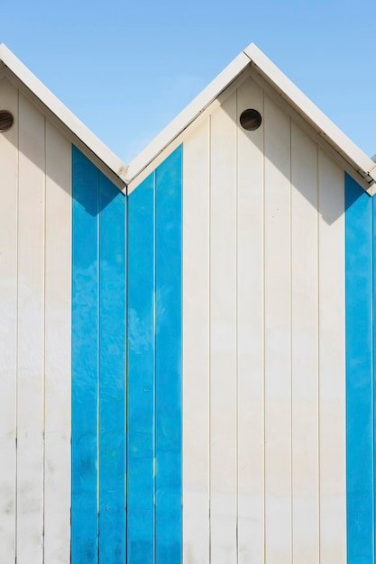 Colorful beach huts and sunny sky