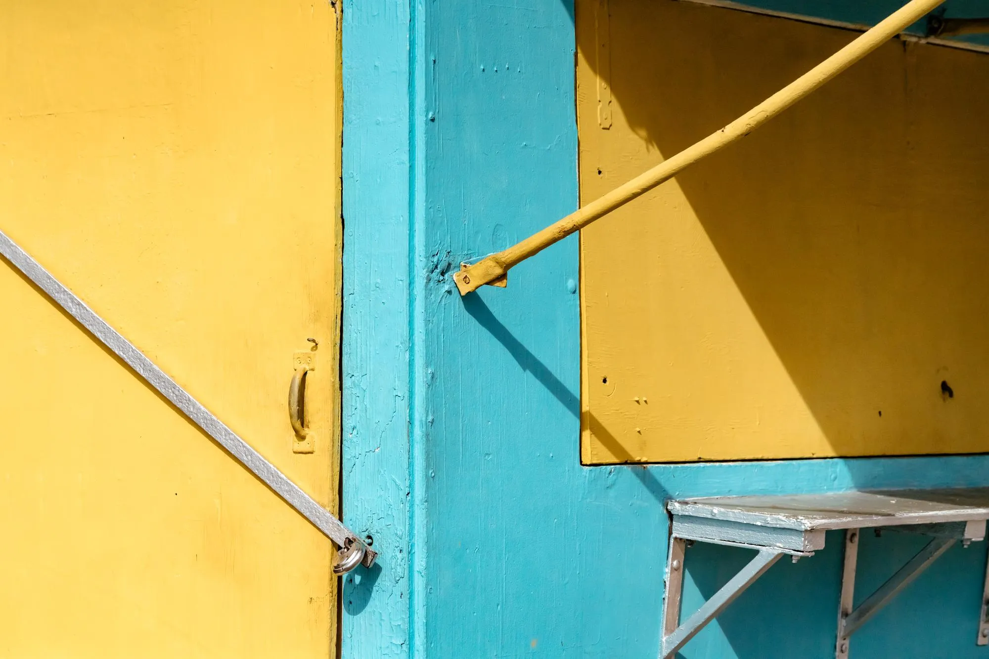 Full frame shot of ladder against yellow wall
