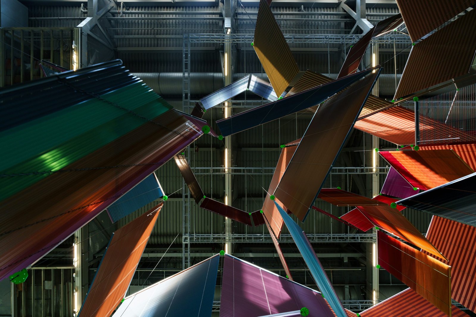 Abstract geometric shapes hanging from ceiling indoors