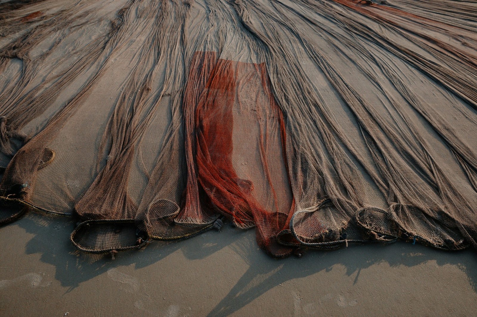 brown and red fishing nets