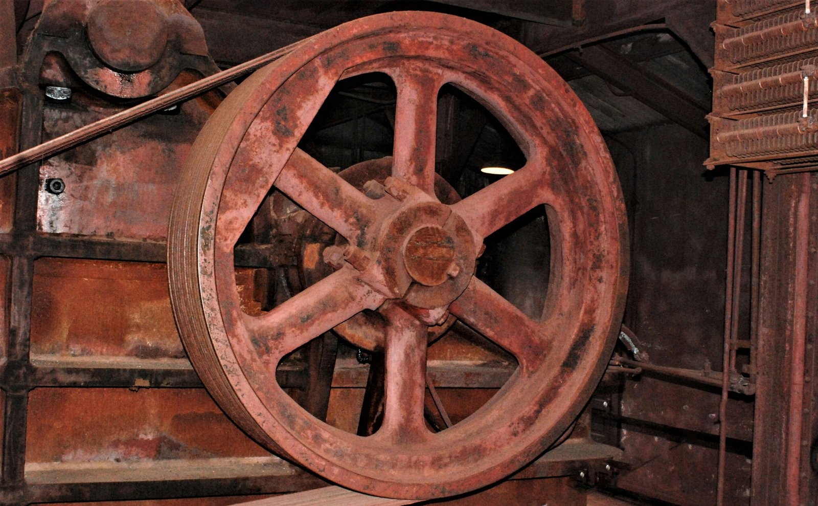 a close up of a large wheel on a machine