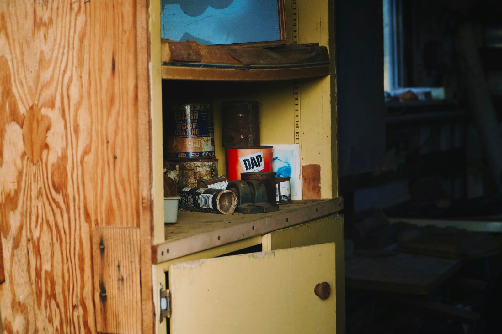 A cabinet with a television on top of it