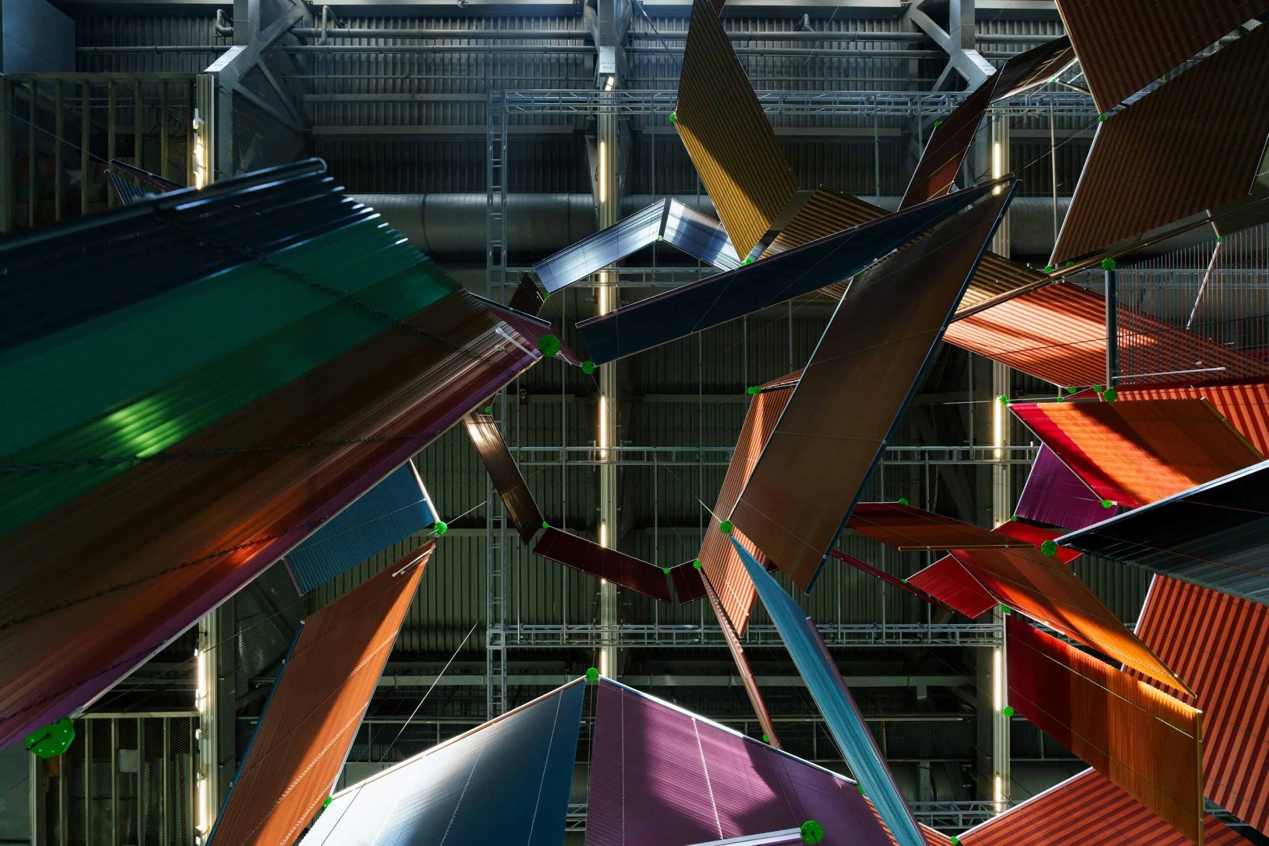 Abstract geometric shapes hanging from ceiling indoors