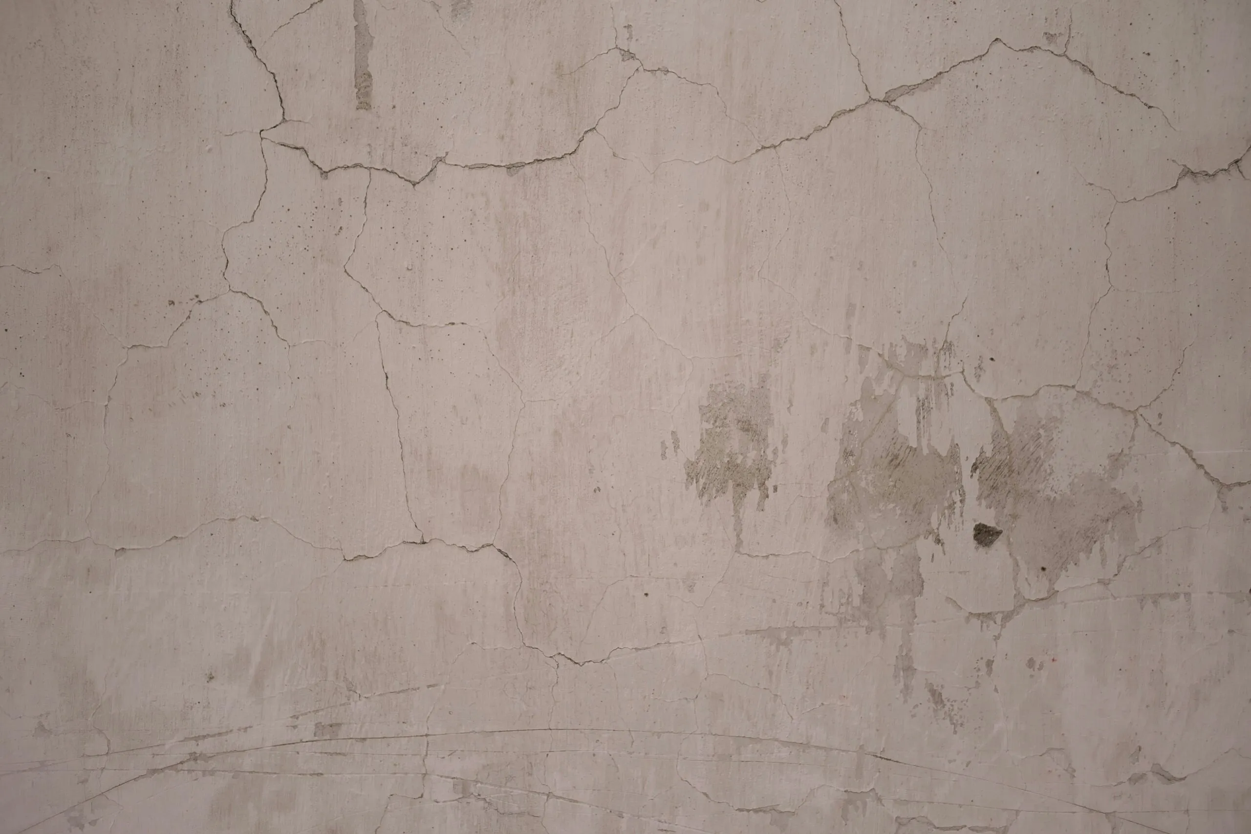 a wall that has some cracks in it