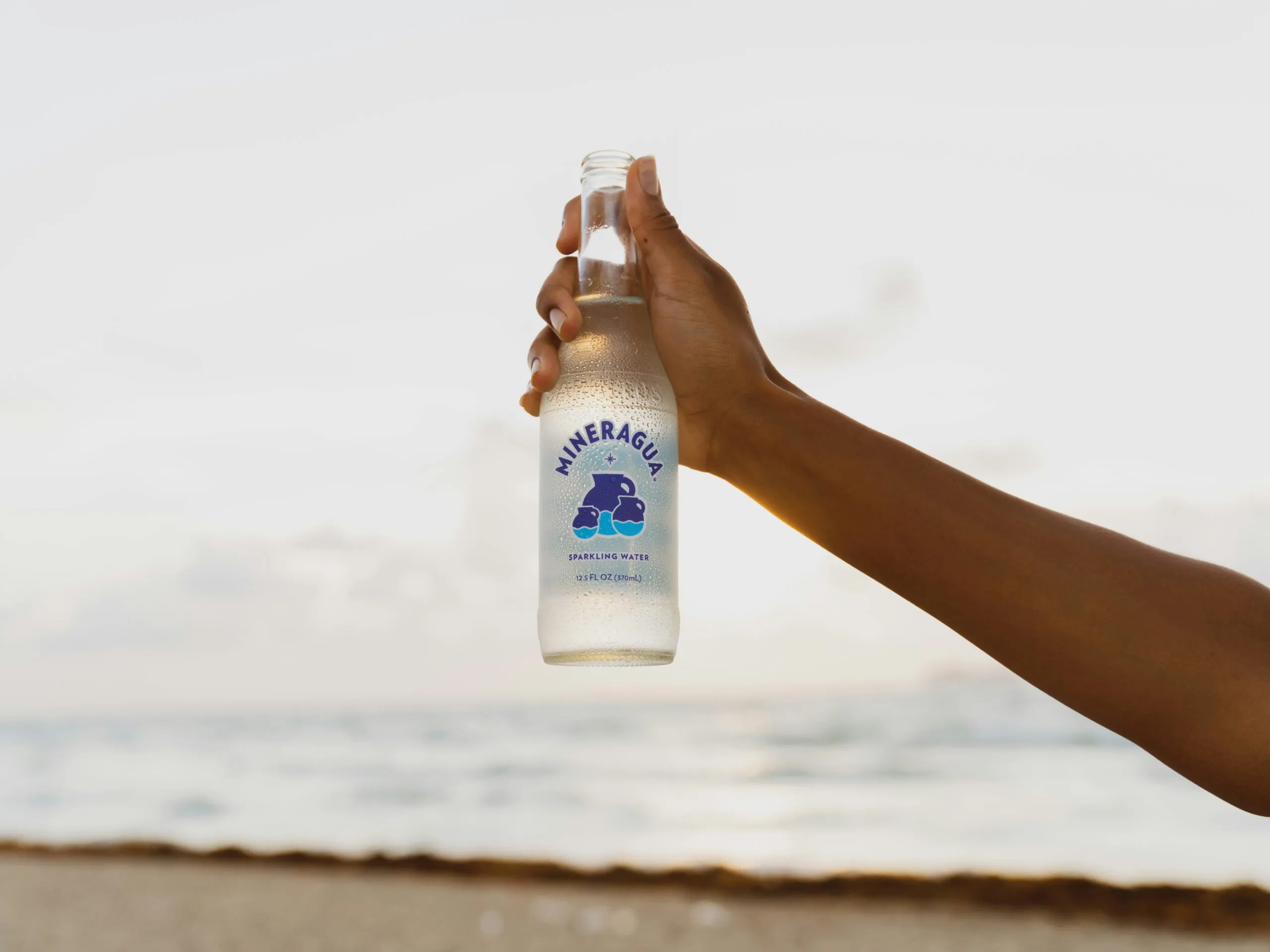 white and blue labeled bottle
