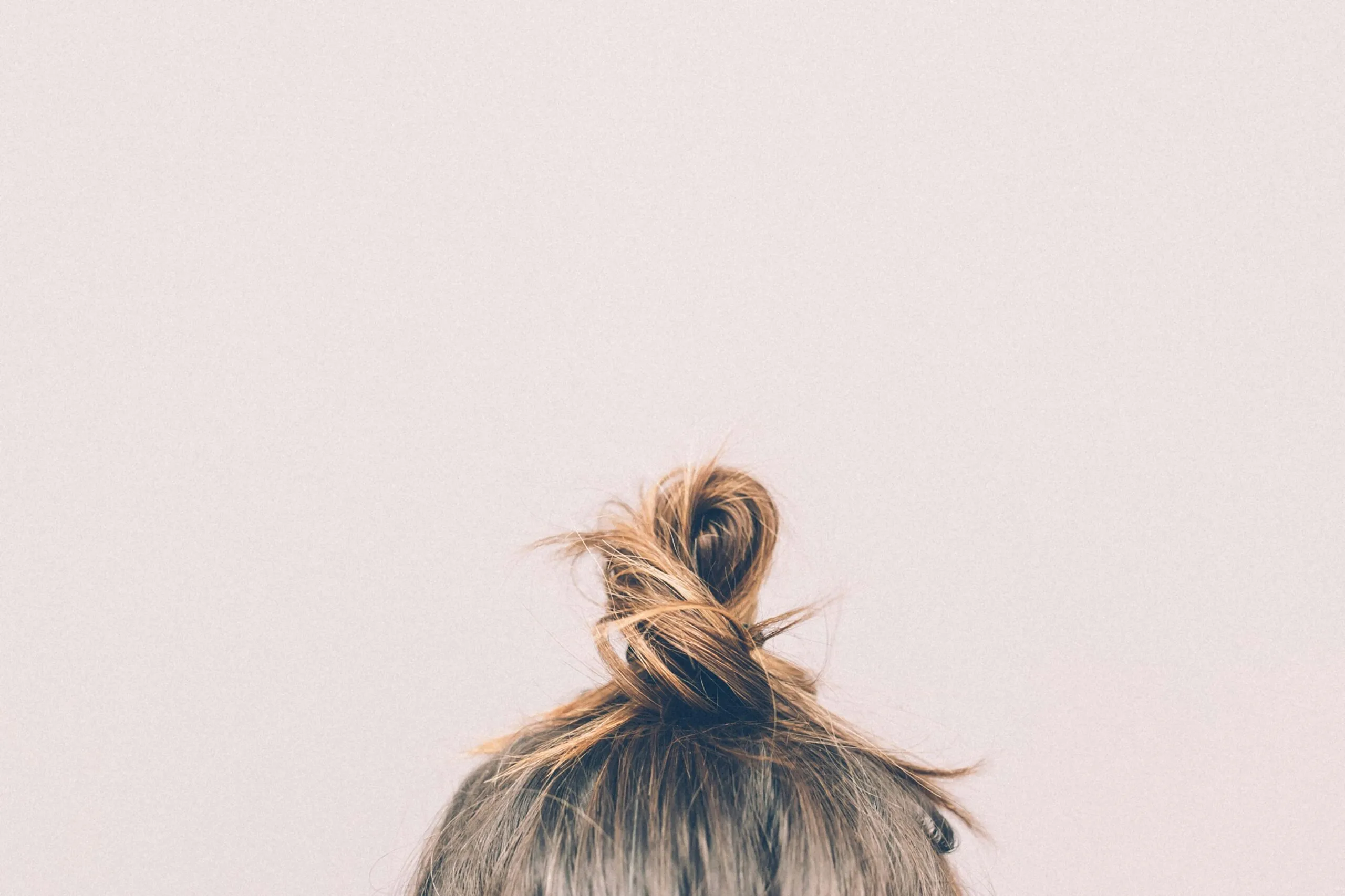 brown and black hair on white background