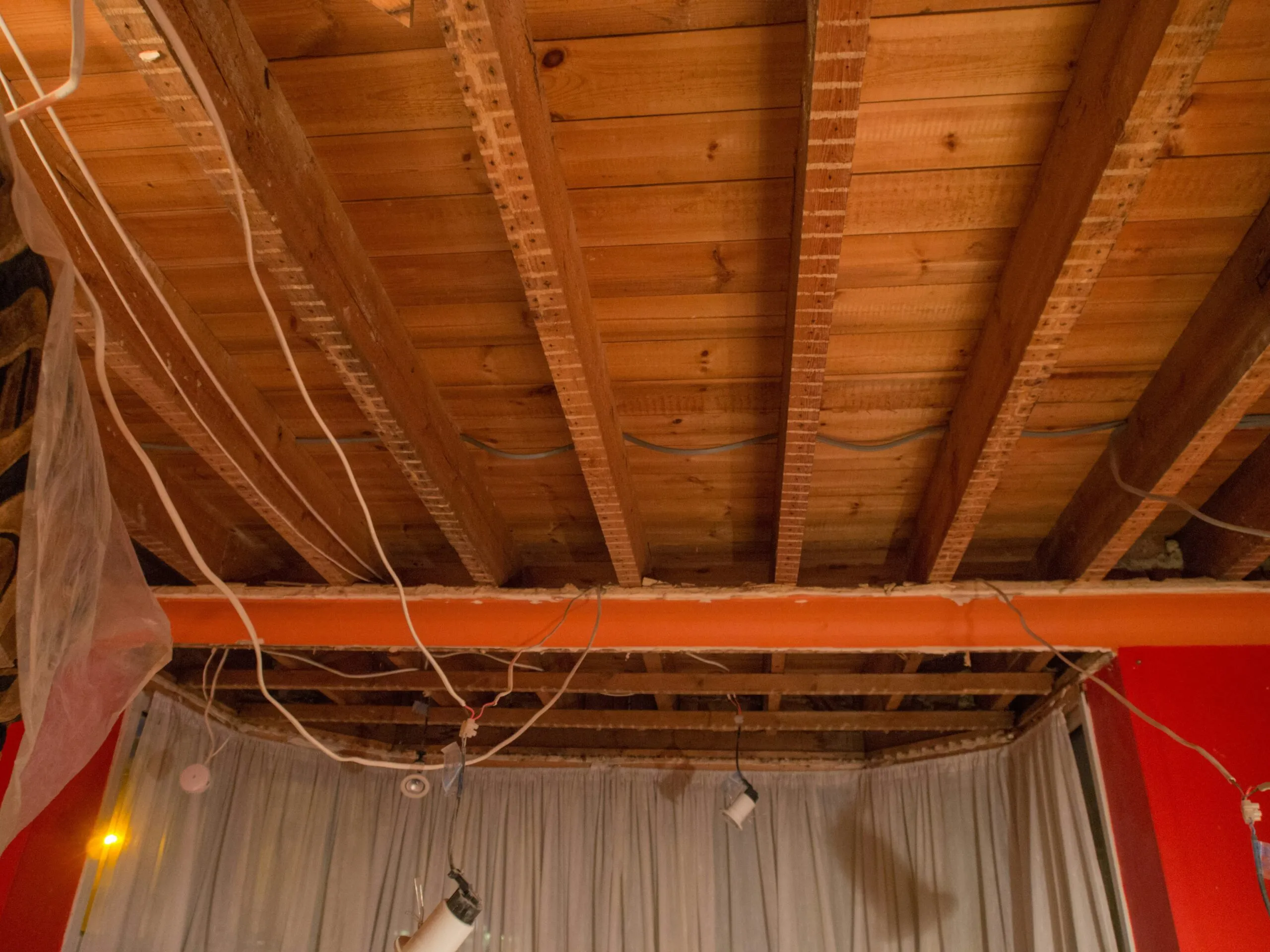 white and brown ceiling with light fixture