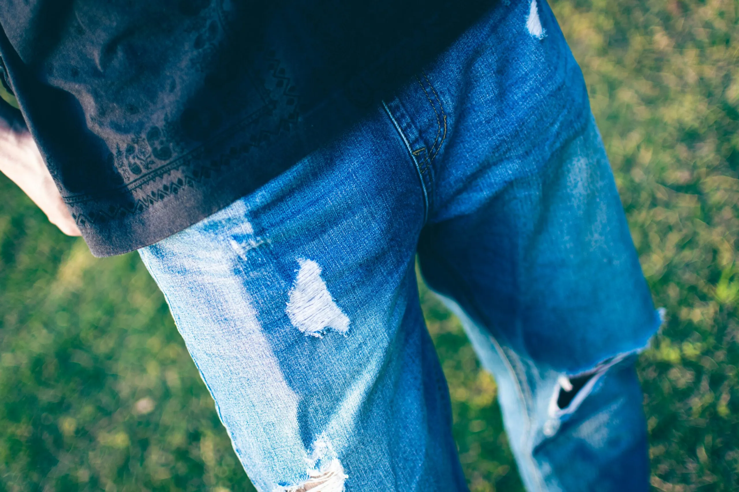 a person's legs and jeans