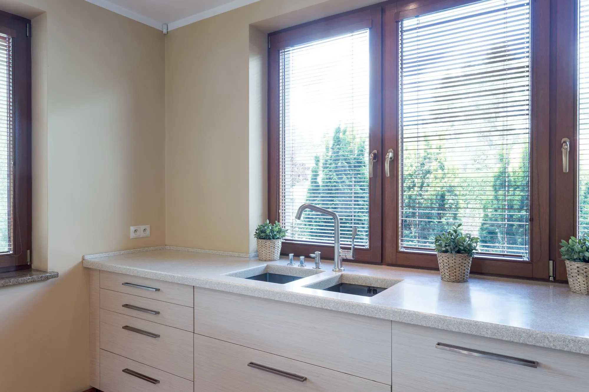 Kitchen with marble kitchentop with sink
