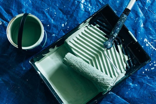 Man is painting wall