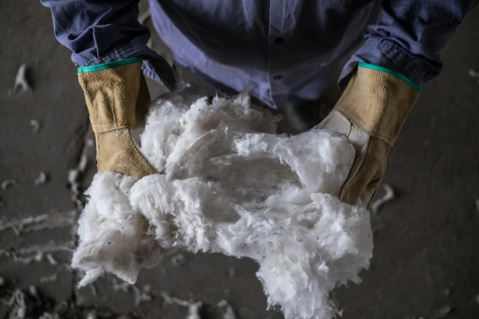 Midsection of person holding cotton