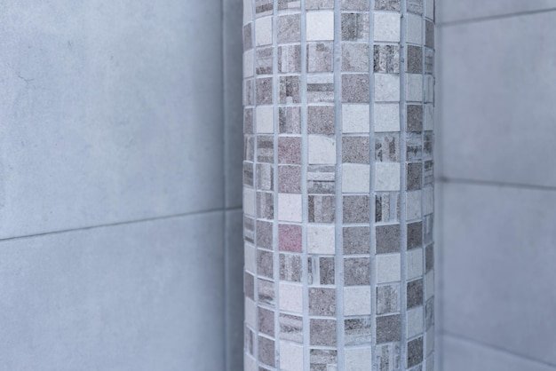 Mosaic column with geometric stone tiles T