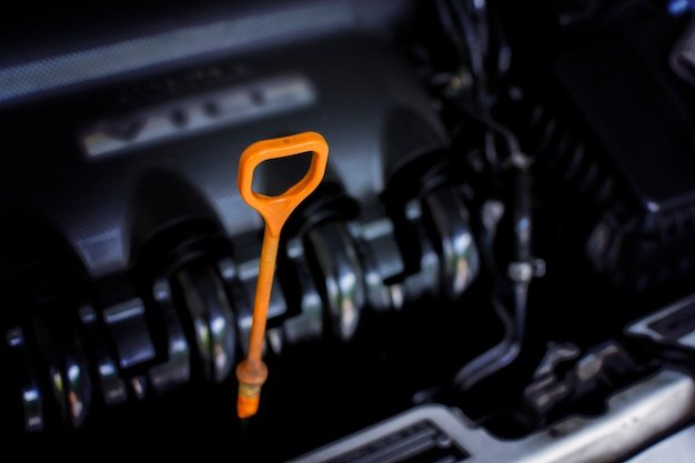 Oil level gauge with orange color for Checking engine oil level