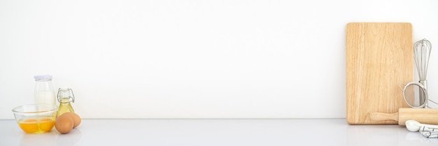 Banner baking ingredients and cooking utensil with copy space on White style kitchen background