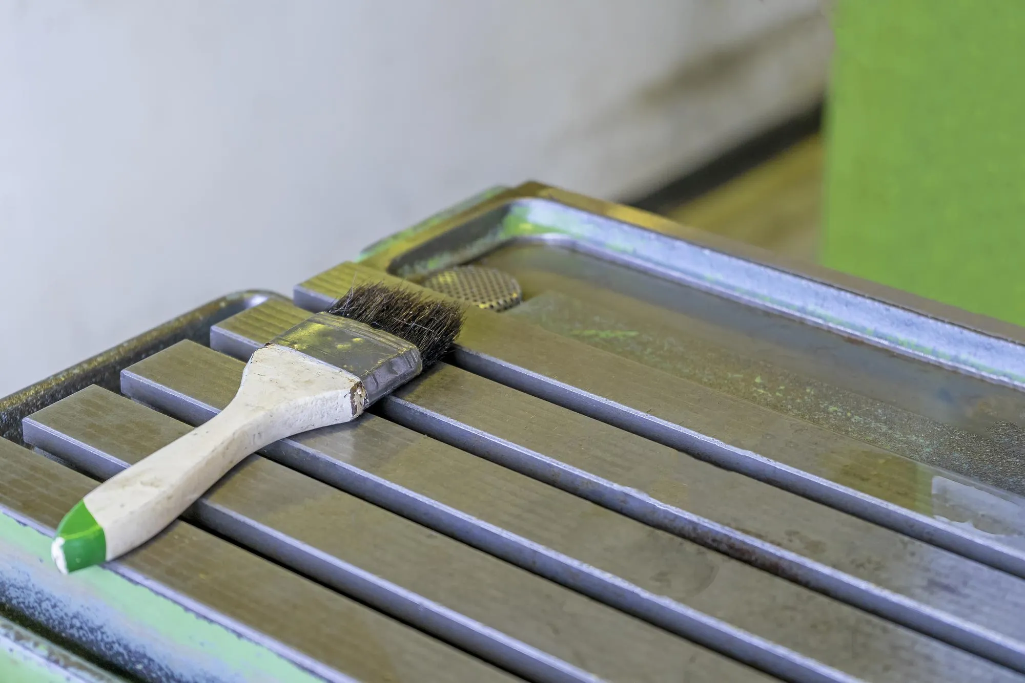 Cleaning brush on cnc machine table workshop