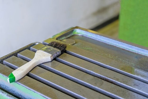 Cleaning brush on cnc machine table workshop