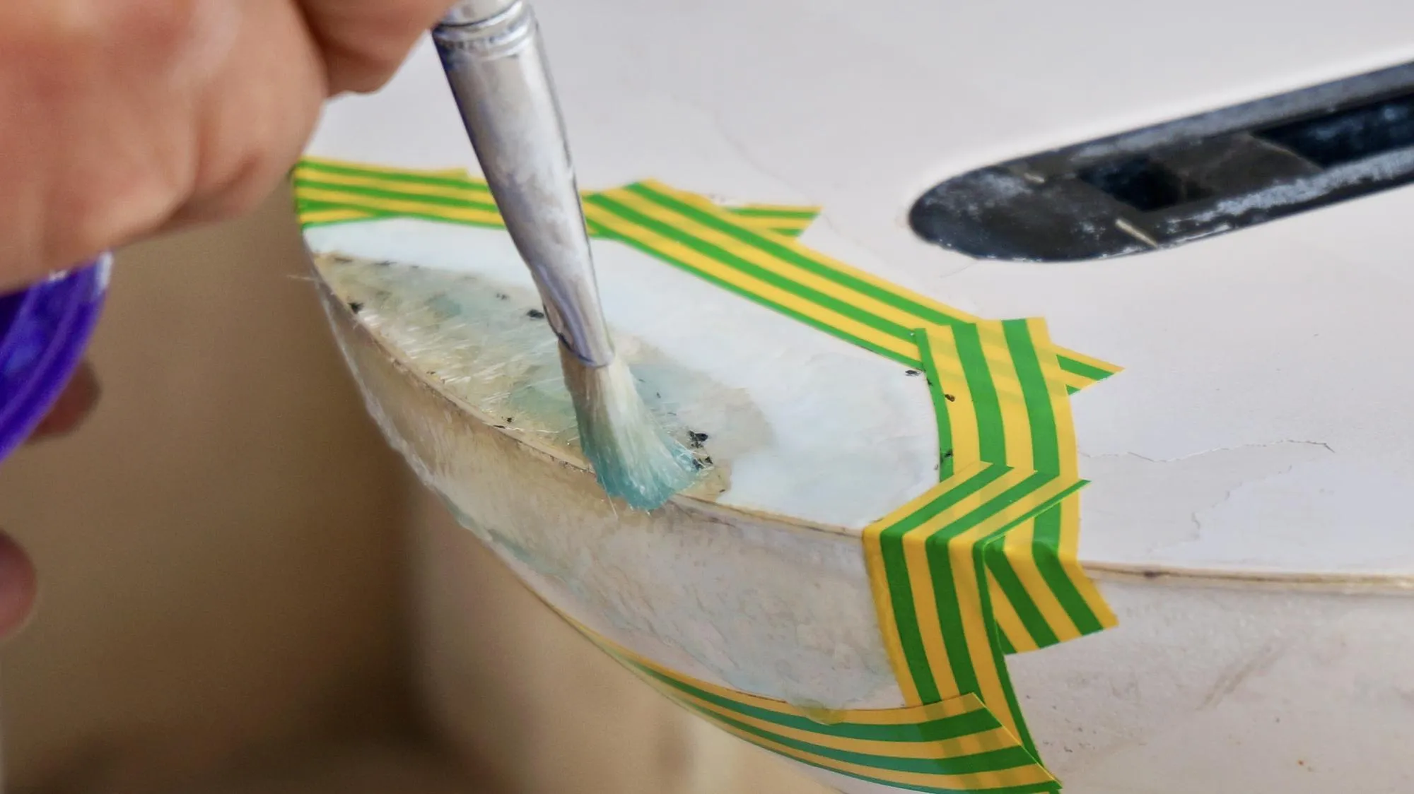 Covering surf board with white gel coat windsurfing board repair process