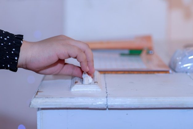 Cropped hand of person using mobile phone