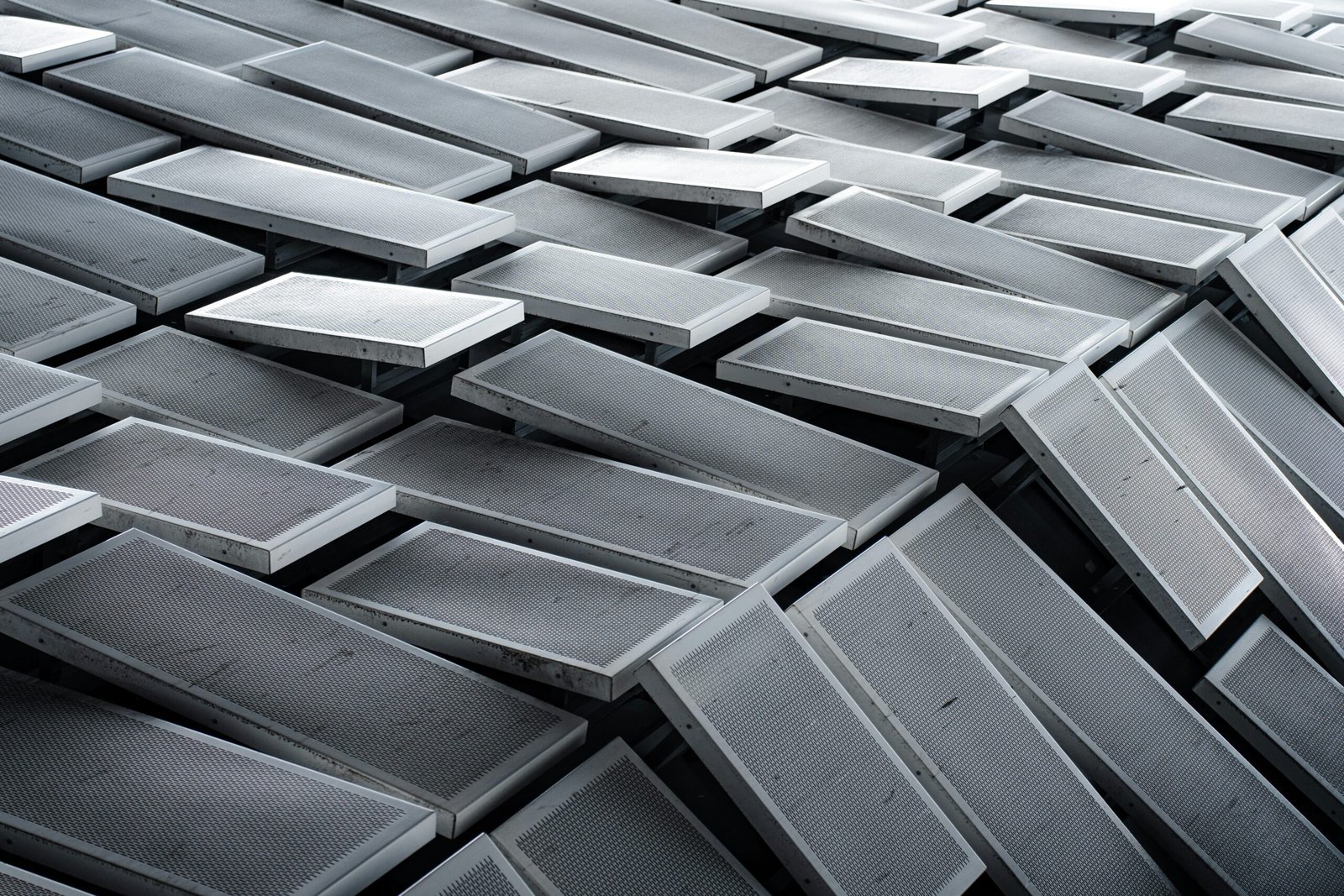 a bunch of metal boxes stacked on top of each other