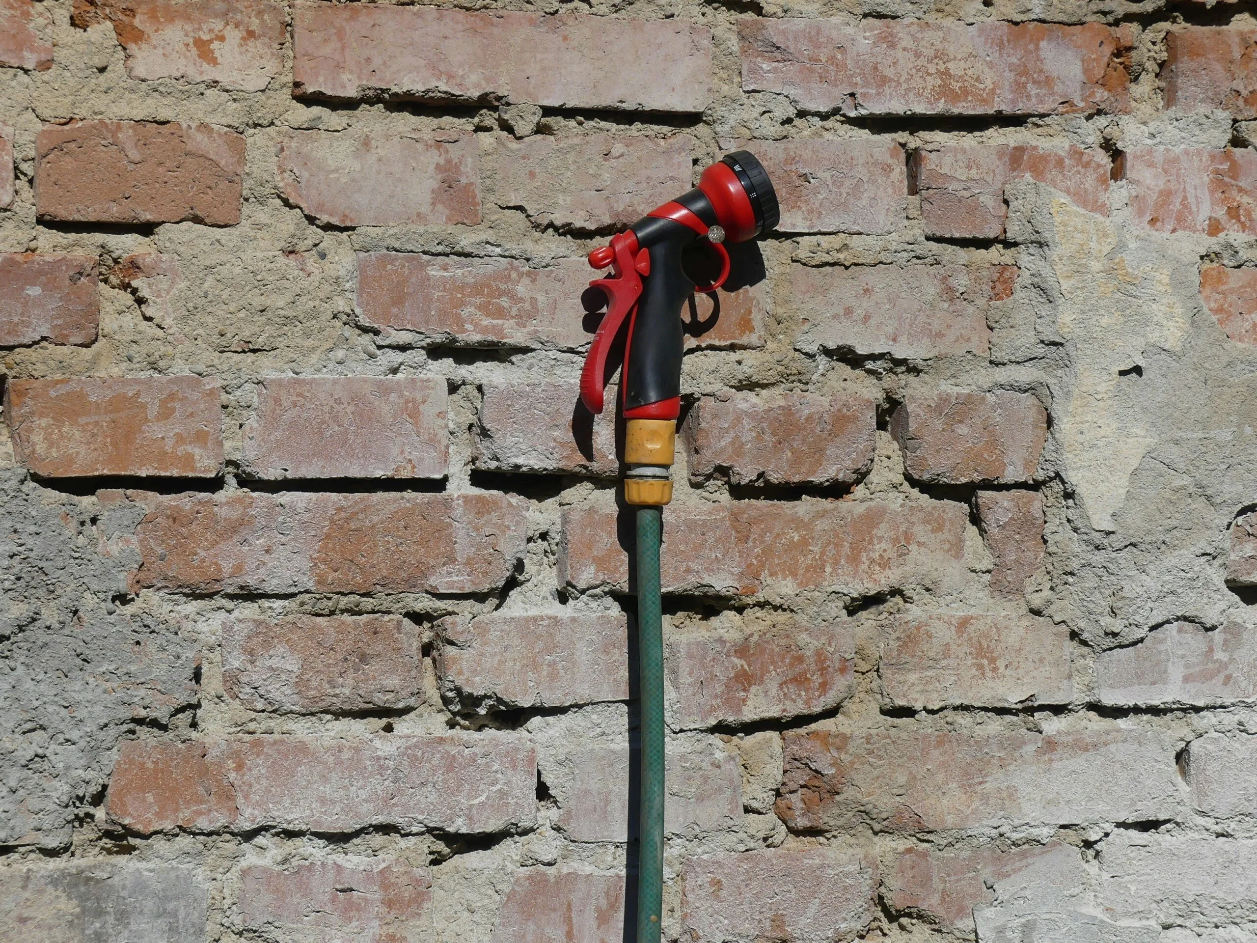 red and black metal tool