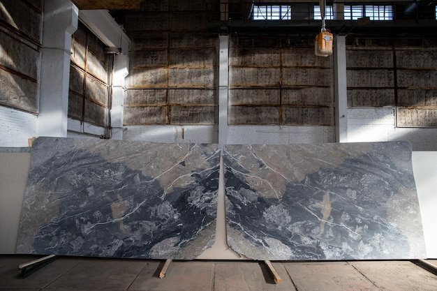 Photo of luxury grey marble slabs in warehouse mirrorlike French marble Breche de Aubisque