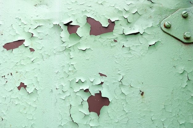 Texture of rusty twocolor reddish and green old shabby oxidized metal iron with bulbted peeling