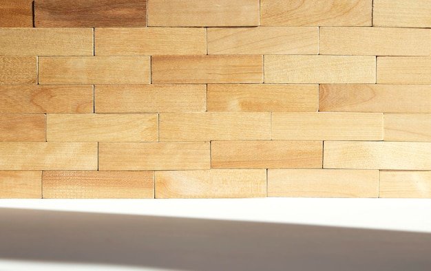 A wall of wooden blocks Rustic background for interior design