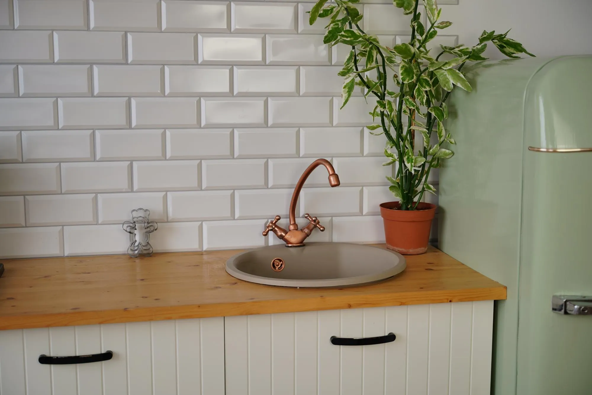 Close up of old kitchen faucet and sink Shabby vintage tap in kitchen