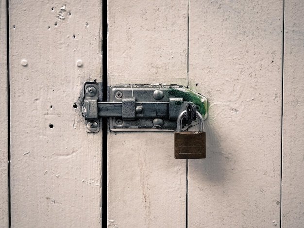 Close-up of padlock on latch