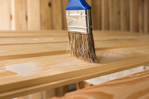 Close-up of paintbrush on wooden table