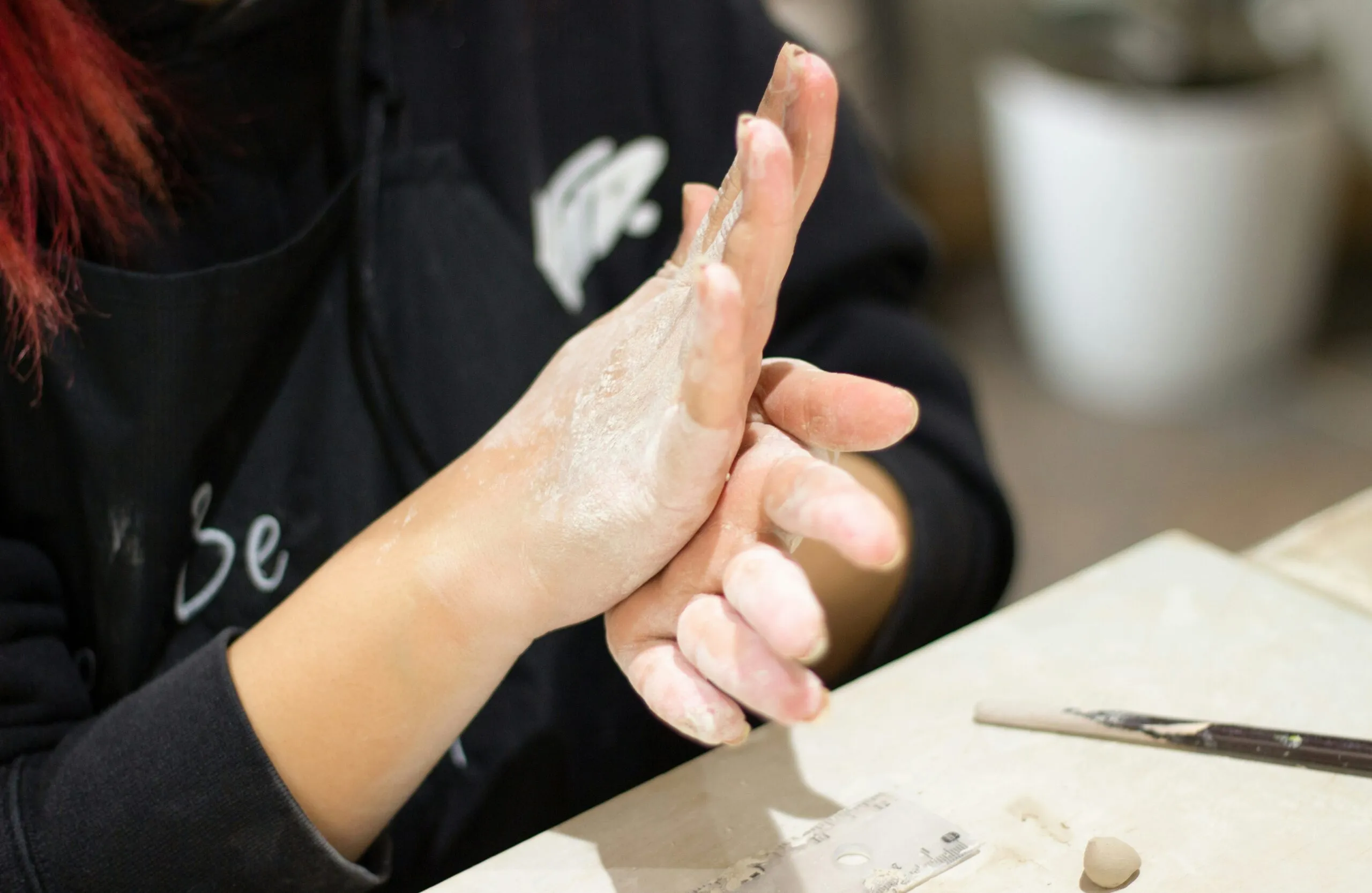 a person holding a piece of paper