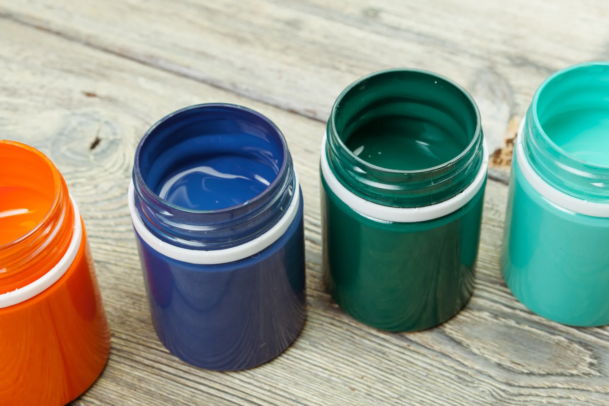 Paint bottels on rustic wooden