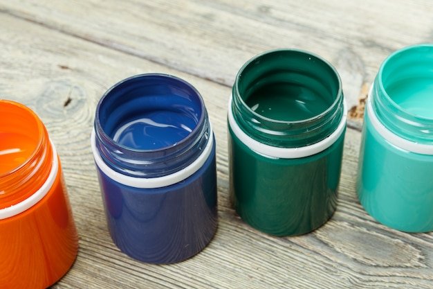 Paint bottels on rustic wooden