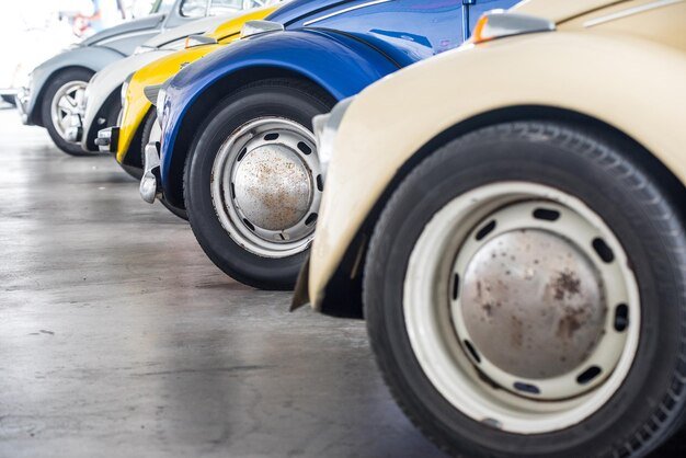 Close-up of vintage cars parked in showroom