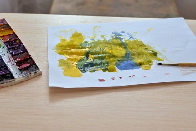 High angle view of paintbrushes on table
