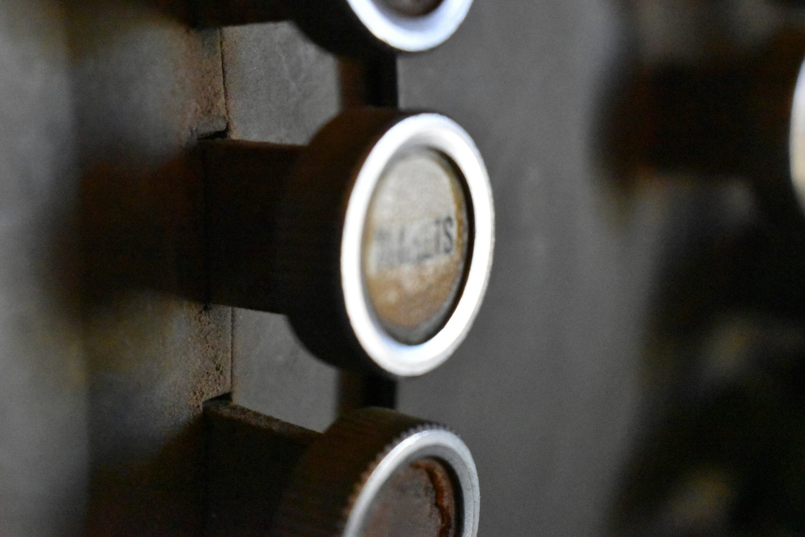 a close up of a bunch of buttons on a wall