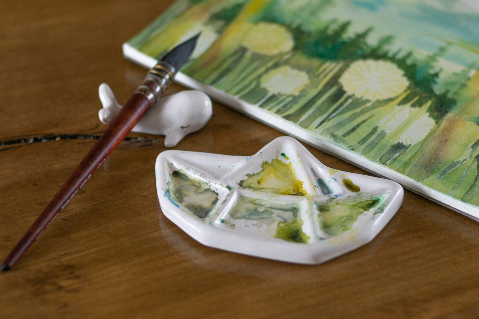 white ceramic square bowl with green and white vegetable salad