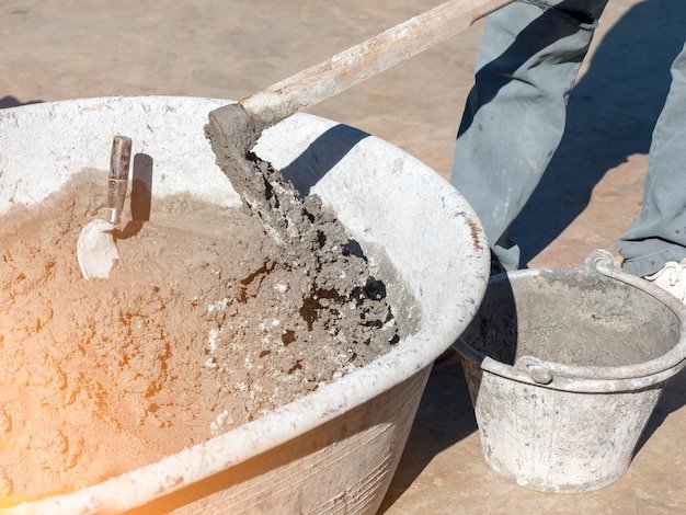 Low section of worker working at construction site