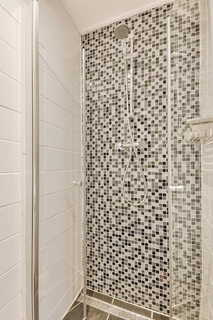 Shower cubicle with mosaic walls