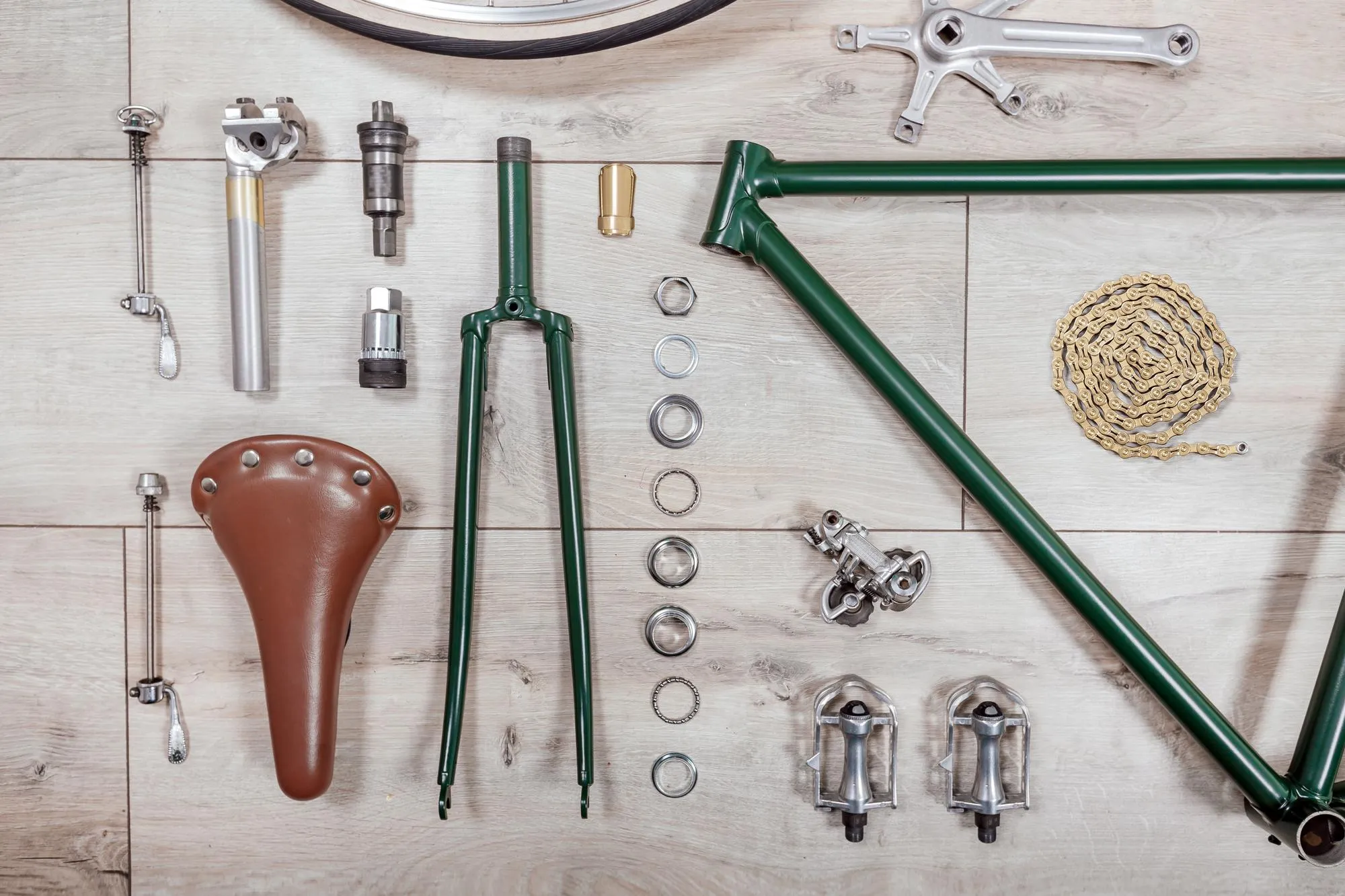 Vintage green bicycle frame and parts top view